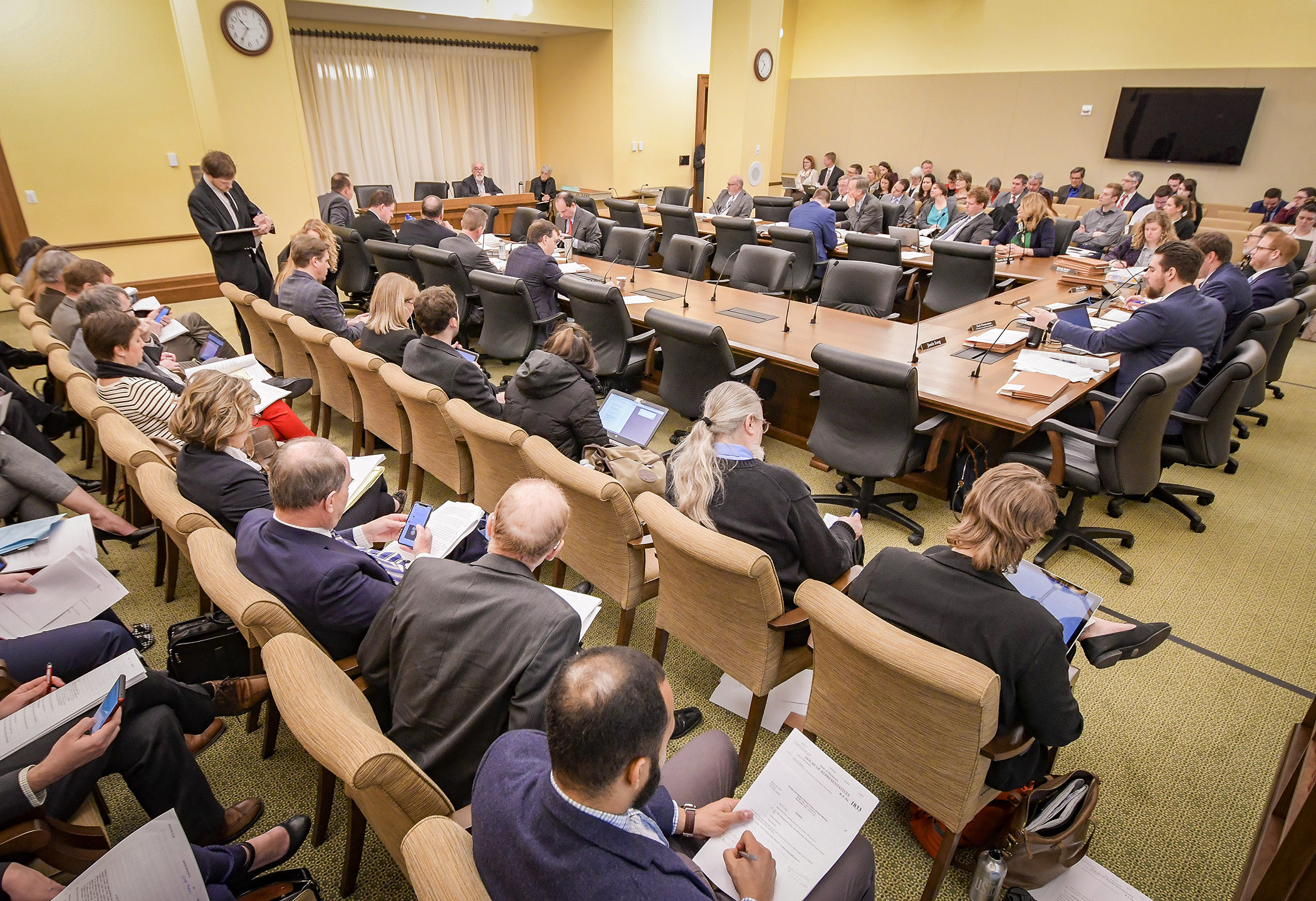 The House Energy and Climate Finance and Policy Division listens to public testimony March 26 on its omnibus bill. Photo by Andrew VonBank